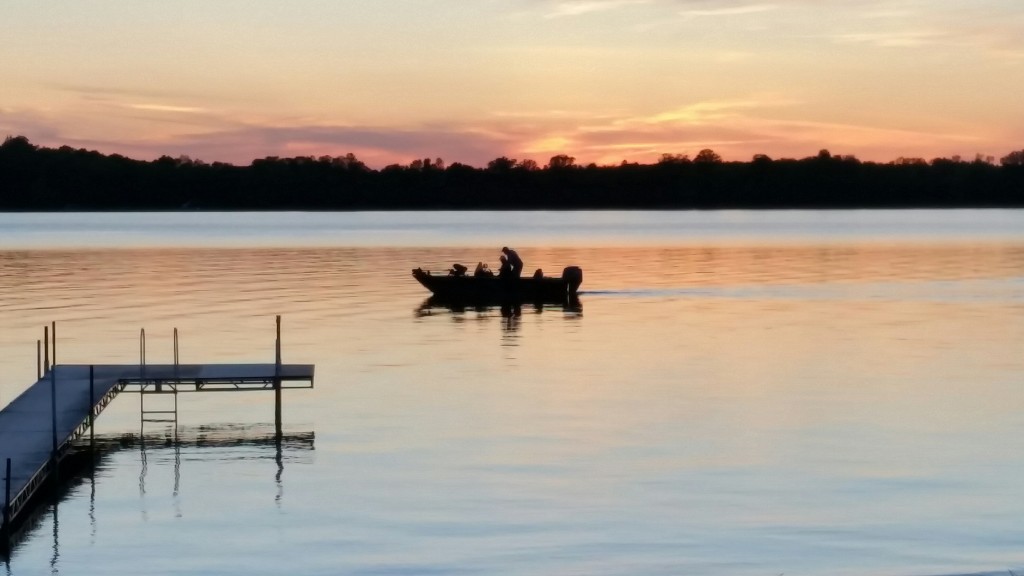 Fishing boat at sunset on Lake Mary